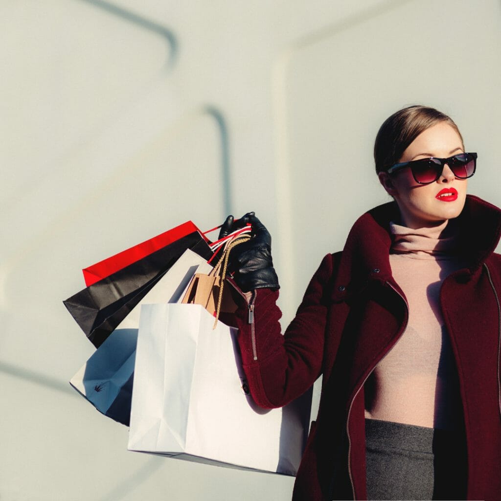 spending money - woman with shopping bags 